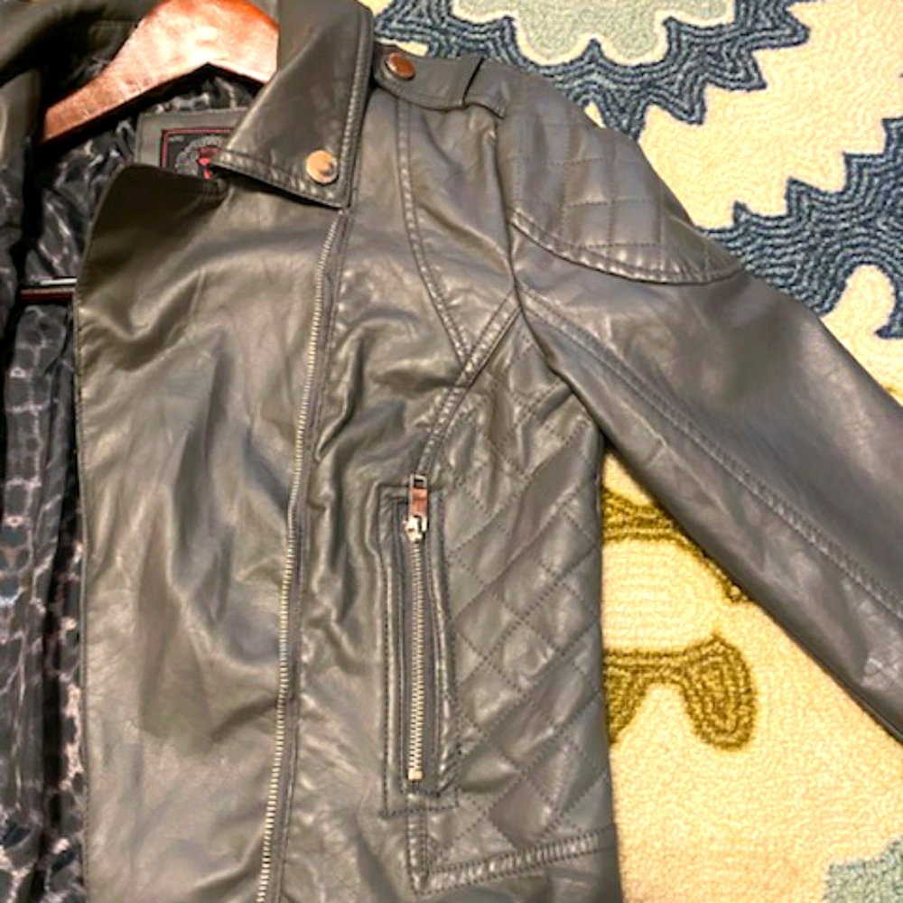 DollHouse leather like lined jacket.